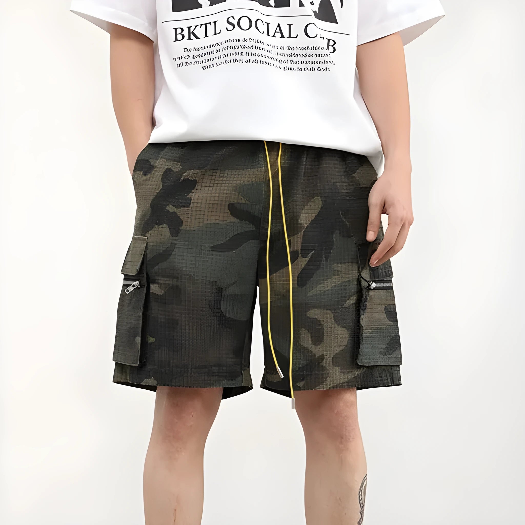 Men's camouflage pattern multi-pocket work shorts in a cropped length.