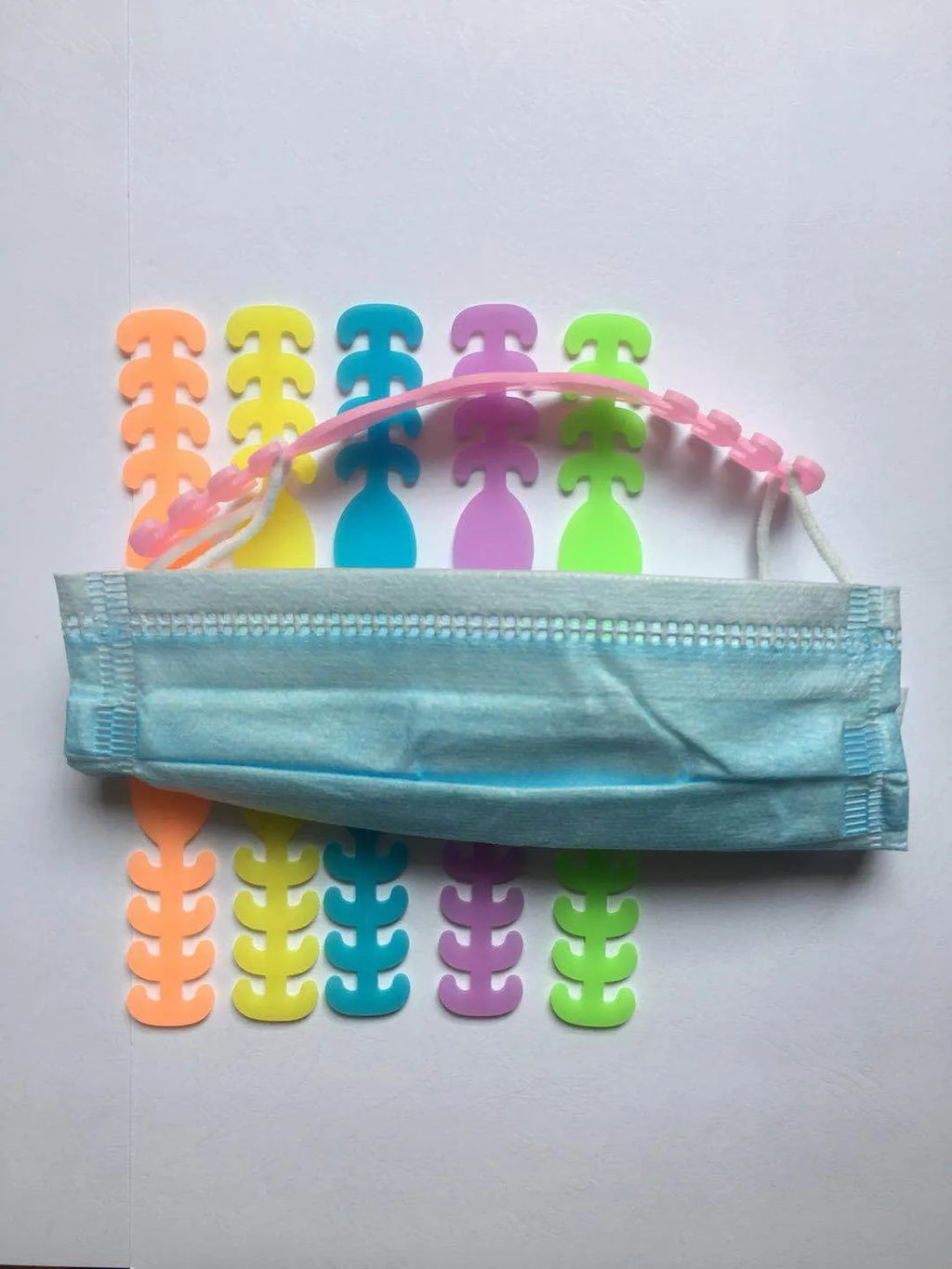 Eight silicone tool buckles in different colours for cable and tool organisation