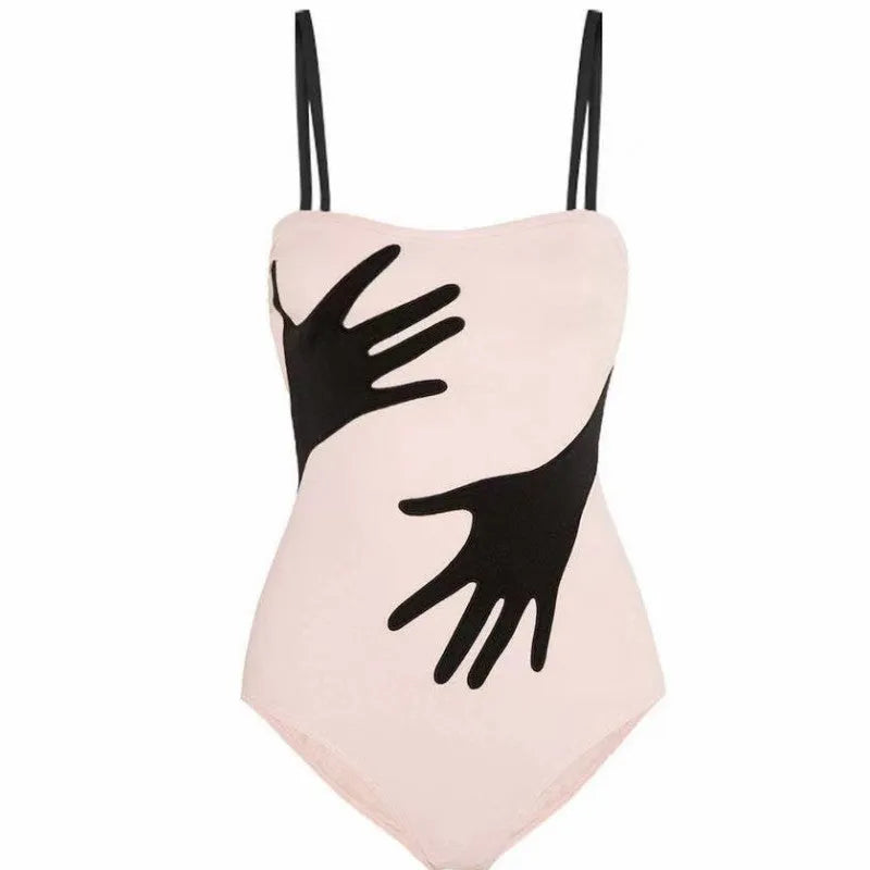 Women's one-piece bikini swimsuit with a gauze skirt, made from polyester fibre.