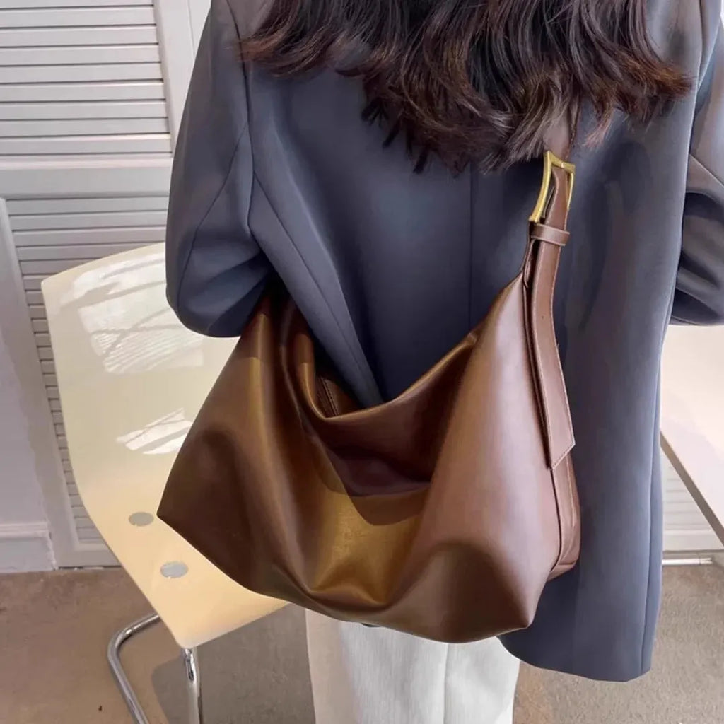 Soft collapse large capacity one shoulder PU tote bag, horizontal square shape, with stitching and contrast colour details, available in five colours including brown and black, 35x16.5x25cm.