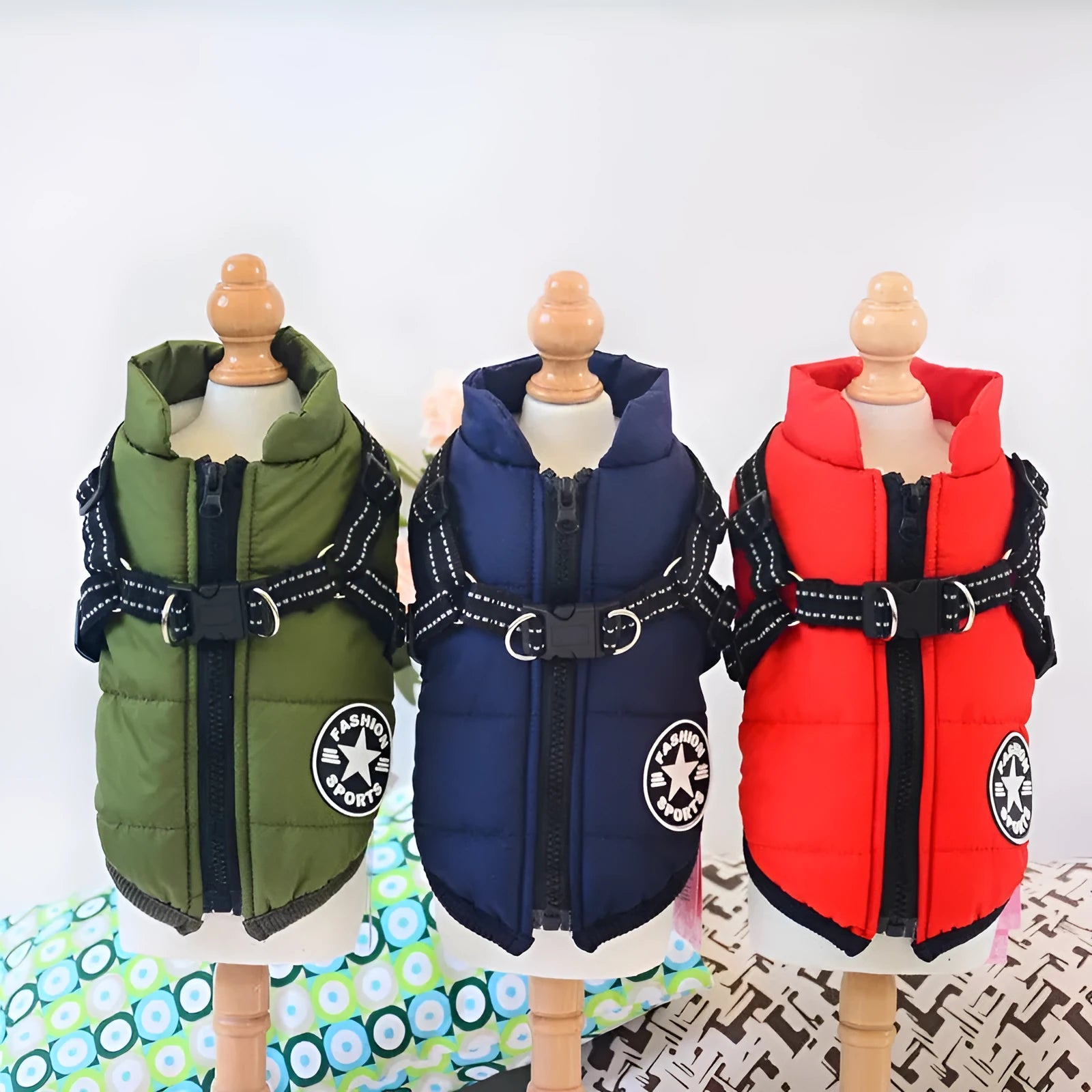 Red waterproof dog coat for large breeds with visible opening for a harness on the back.