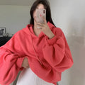Watermelon red women's sleeveless hooded sweater made from loose-fitting Mulberry silk.