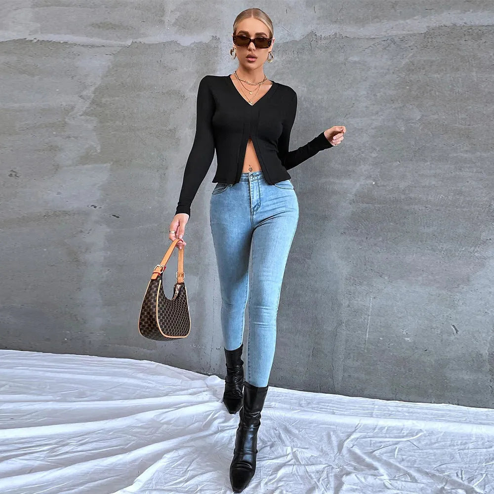 Black women's long sleeve slim fit cropped T-shirt with split neck and slit detail, sizes XS-XL