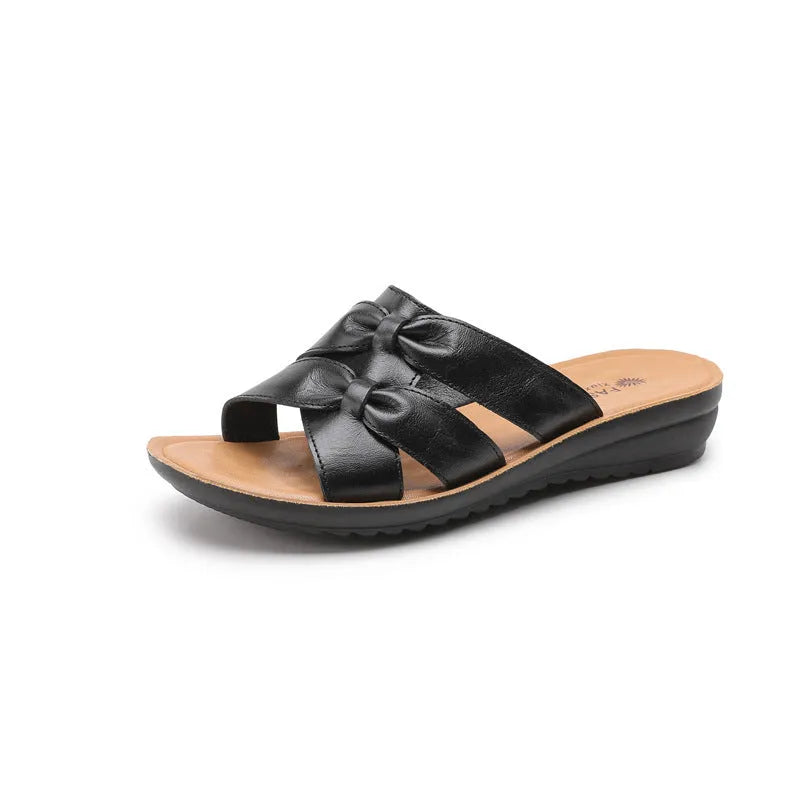 Women's cowhide leather slippers with soft non-slip bottom in beige, black, and red colour options
