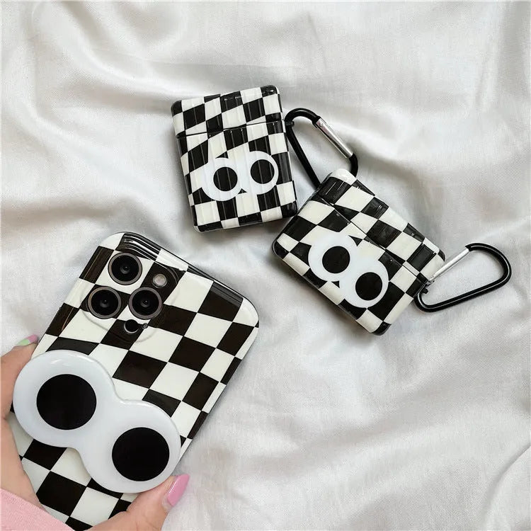 Black and white checkerboard pattern AirPods protective cover with large eye design for Apple AirPods models