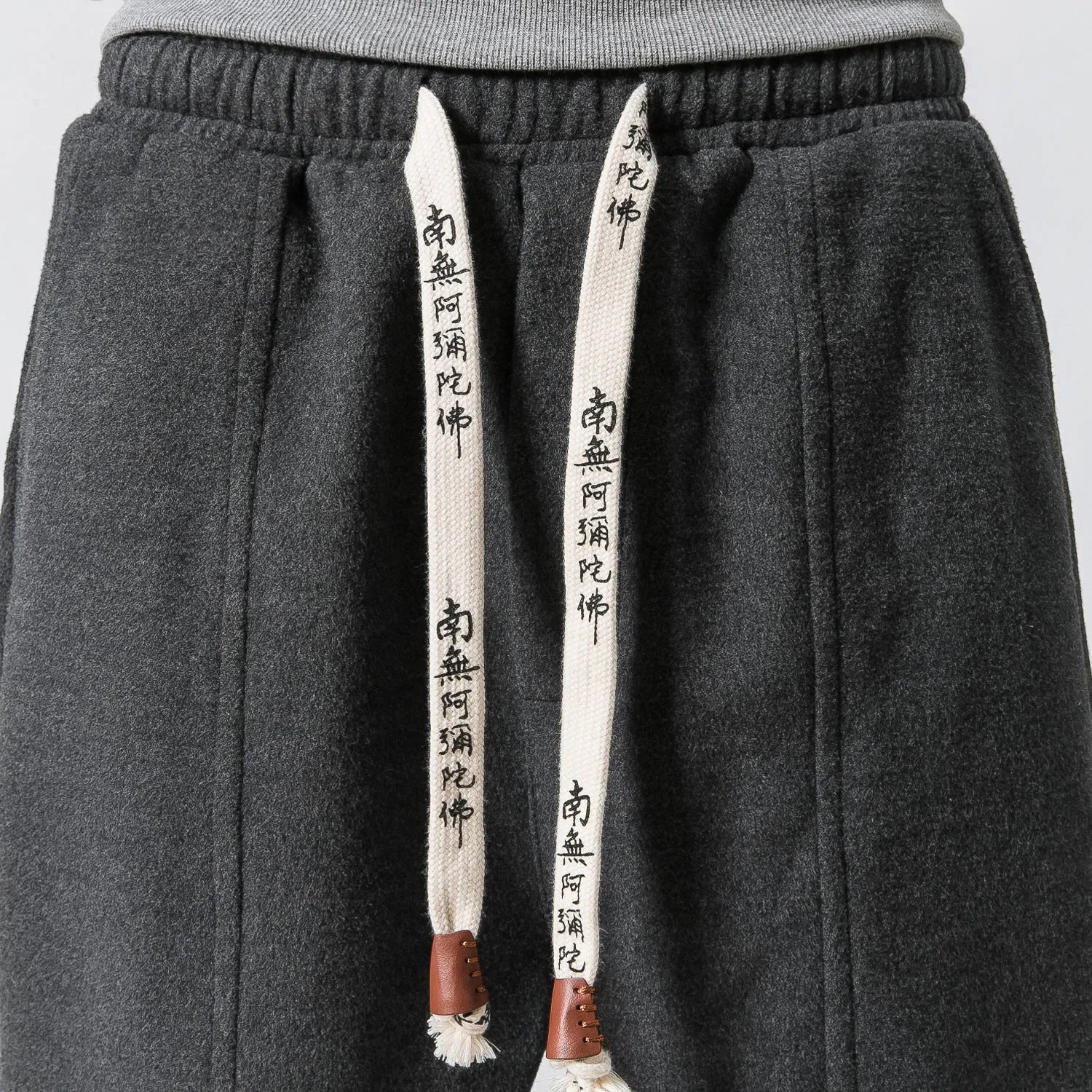 Teen loose fit harem casual pants in dark grey with elastic waist and slant pockets