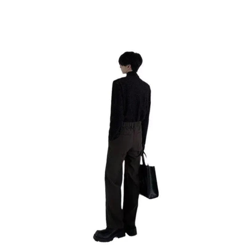 Women's black high-waisted cropped suit pants with draping effect, sizes M-3XL, on display