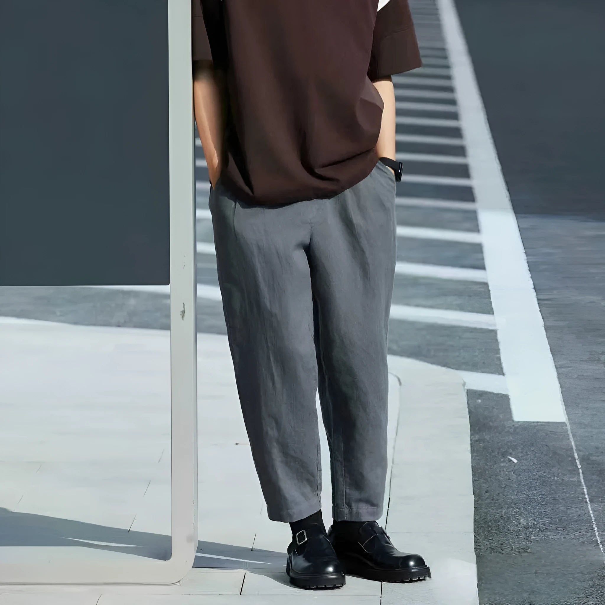 Men's loose-fitting straight-leg casual pants in beige with a drawstring waistband.