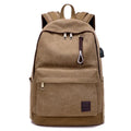 Canvas USB rechargeable backpack in khaki colour showing laptop pocket and shoulder straps