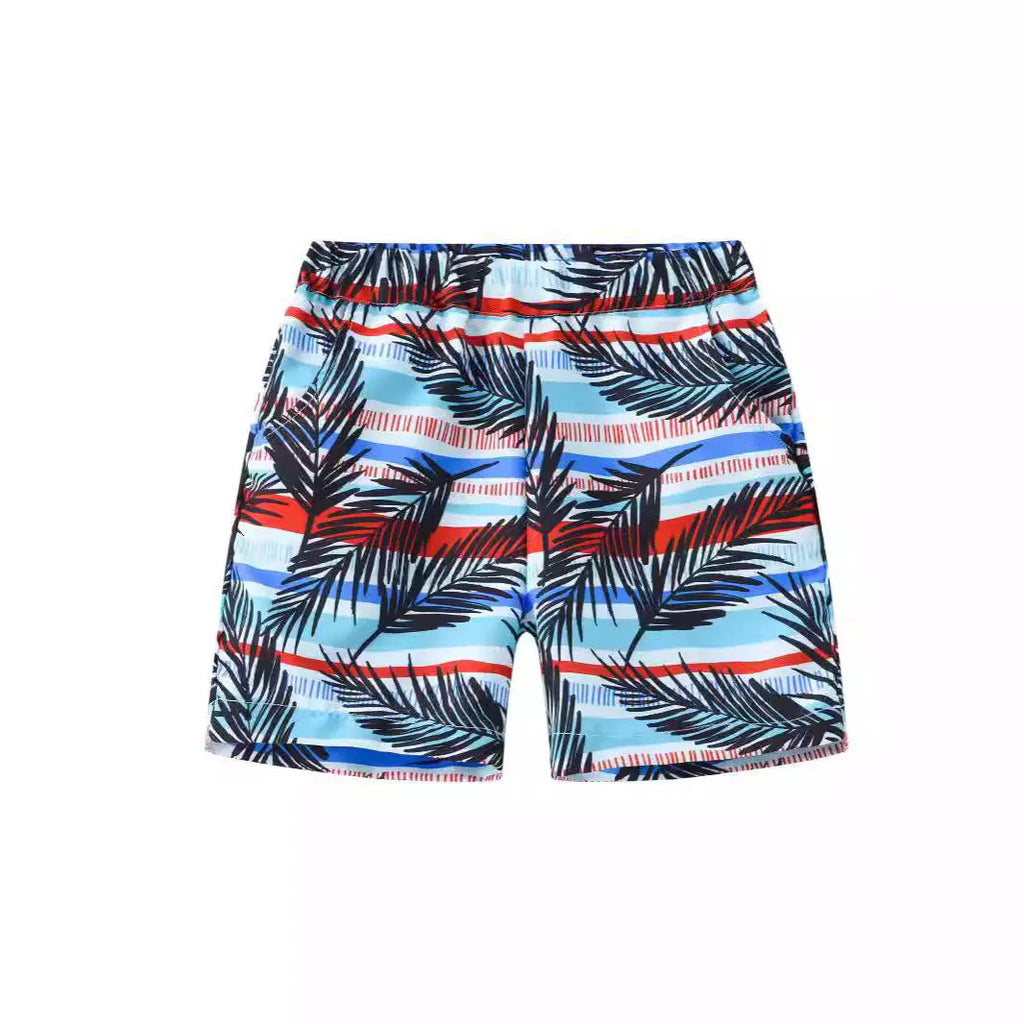 Children's elastic waist beach shorts with colourful coconut tree print, shown in shorts length.