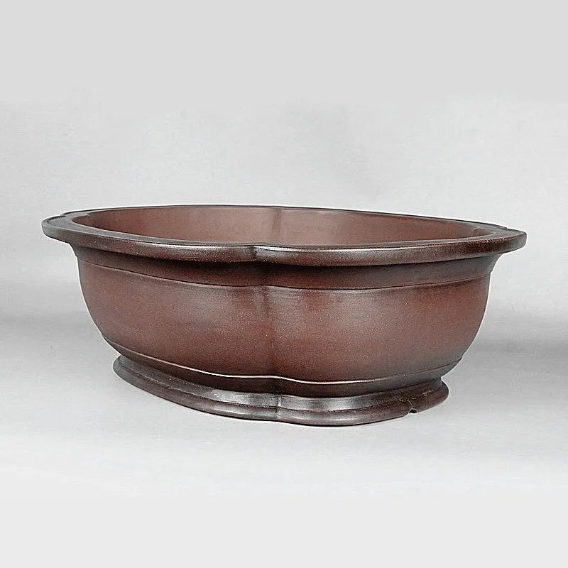 Handmade Chinese style crabapple-shaped purple clay flowerpot for plants.