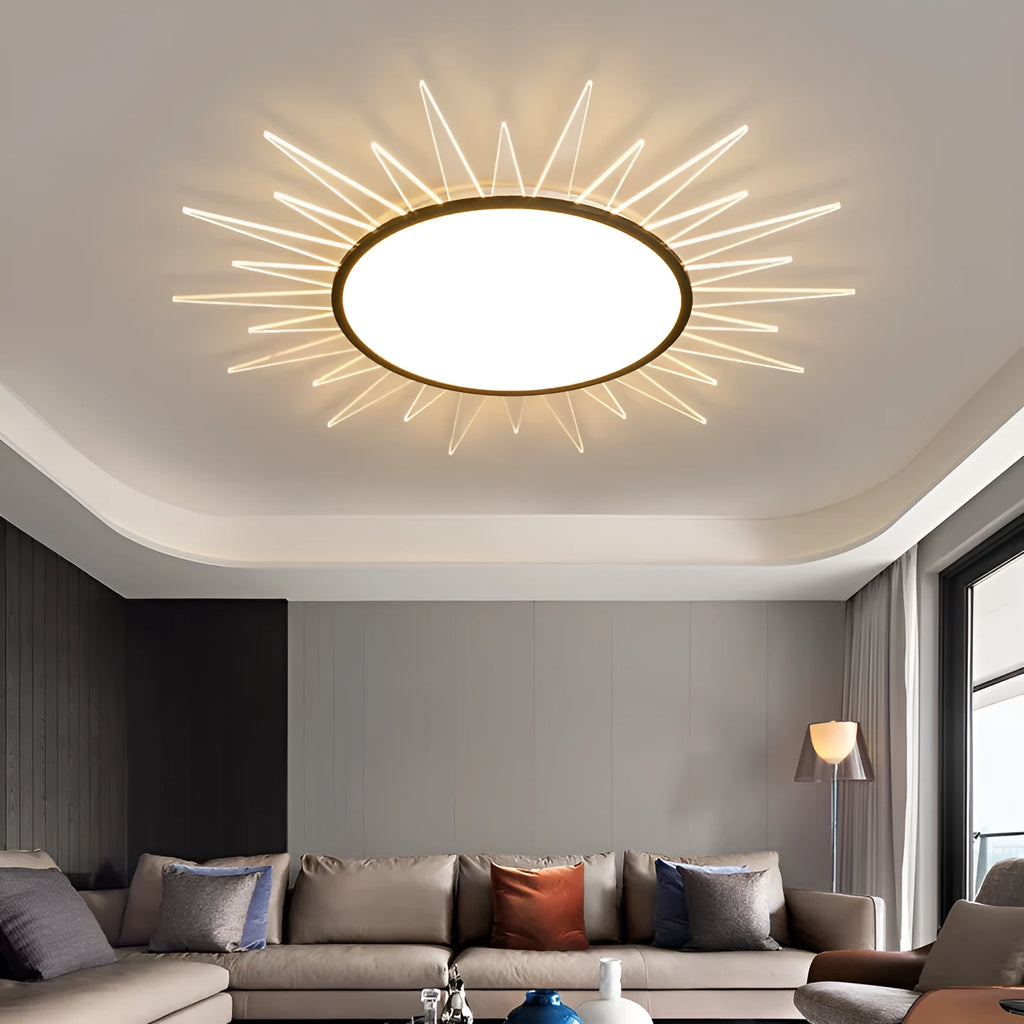 Modern round aluminium LED ceiling lamp with remote control on a white ceiling.