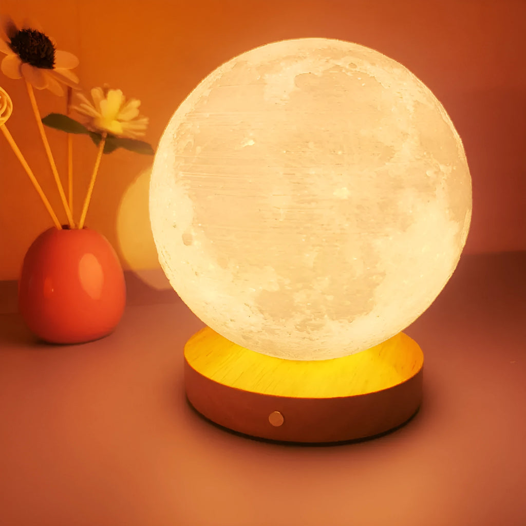 Rotating sleeping moon night lamp with wooden base in Nordic style