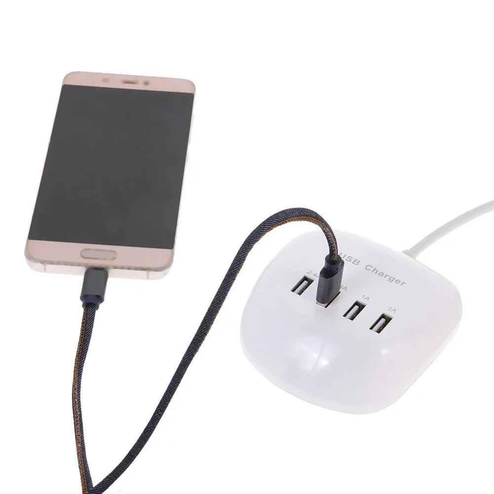 White dual USB wall charger with EU plug style on a plain background