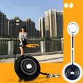 Small black Snap Bluetooth remote control for wireless smartphone camera photos on a white background.