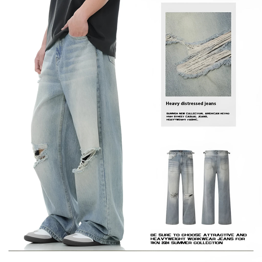 Men's blue straight-leg ripped jeans on a white background showing retro detailing and zip fly