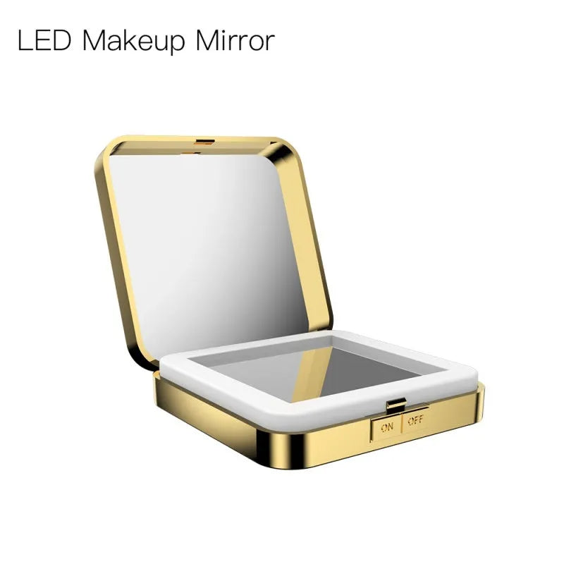Black and white makeup mirror on table showing magnified and regular mirrors with illuminated ring light