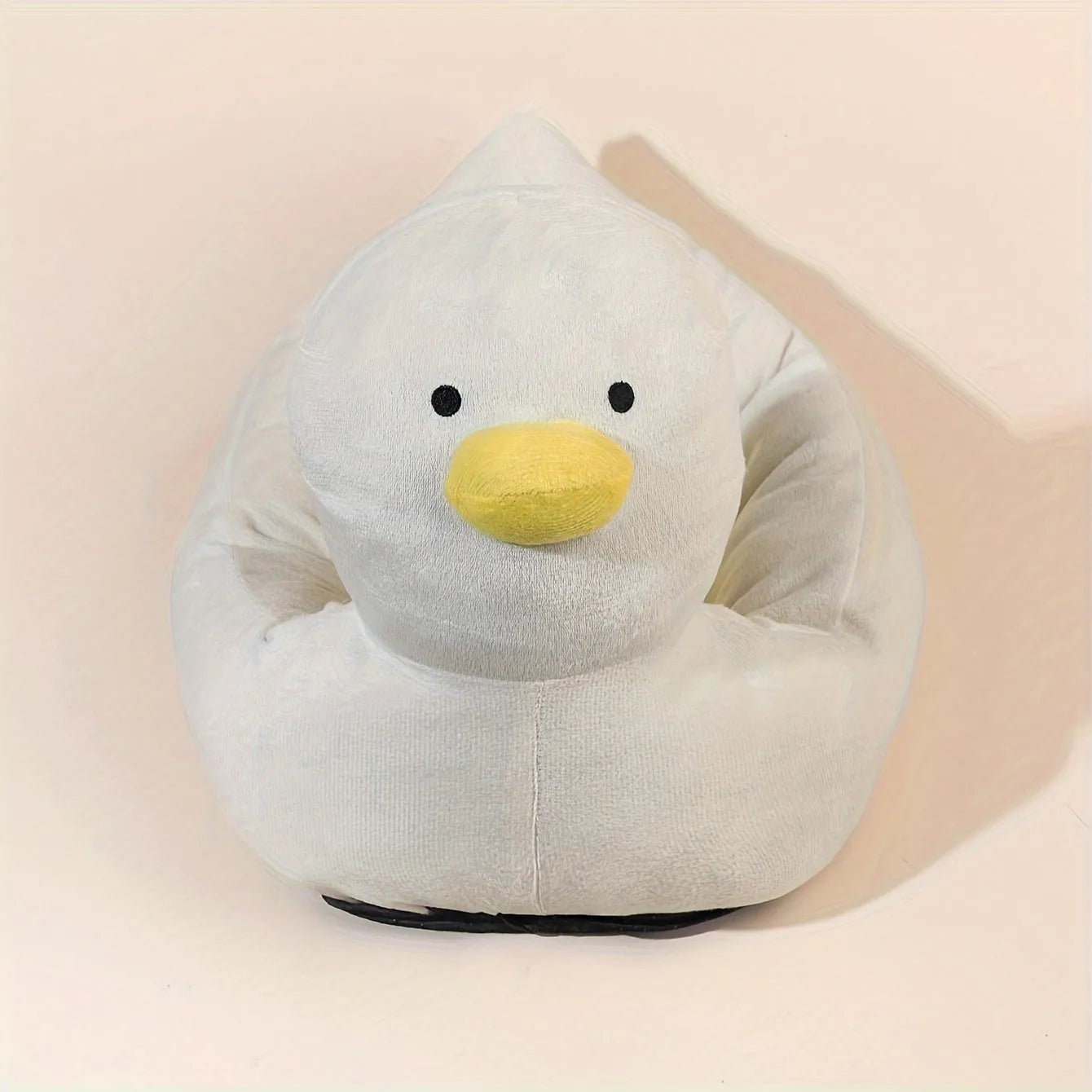 Blue duck-shaped fluffy pet bed for small dogs and cats on floor
