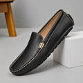 Men's leather driving shoes in black, white, or orange with flat wedge heel, round toe, and sewn rubber sole, sizes 38 to 47
