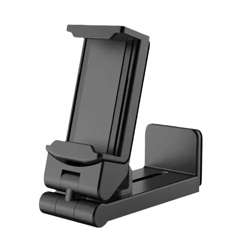 H22 Black colour 360-degree rotating collapsible mobile phone desktop holder on a wooden table.