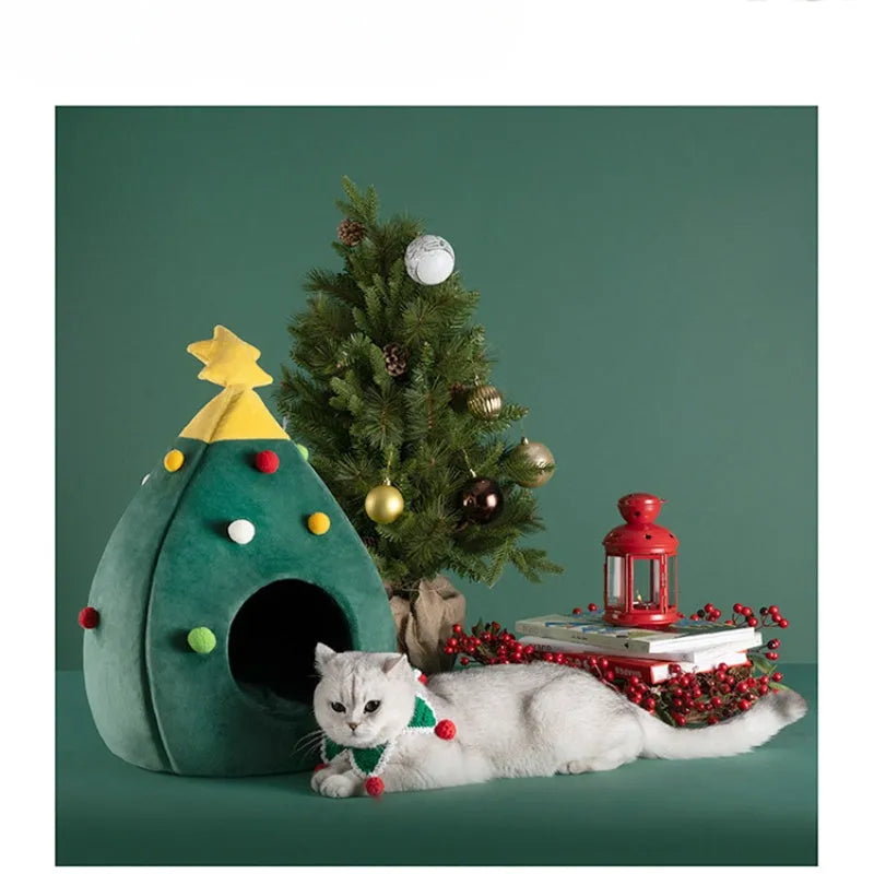 Red Christmas tree shaped cave pet bed with plush interior for a cat or small dog.