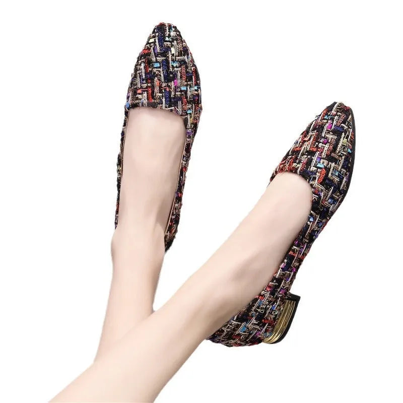 Women's black and white casual canvas shoes with pointed toe and low-cut design