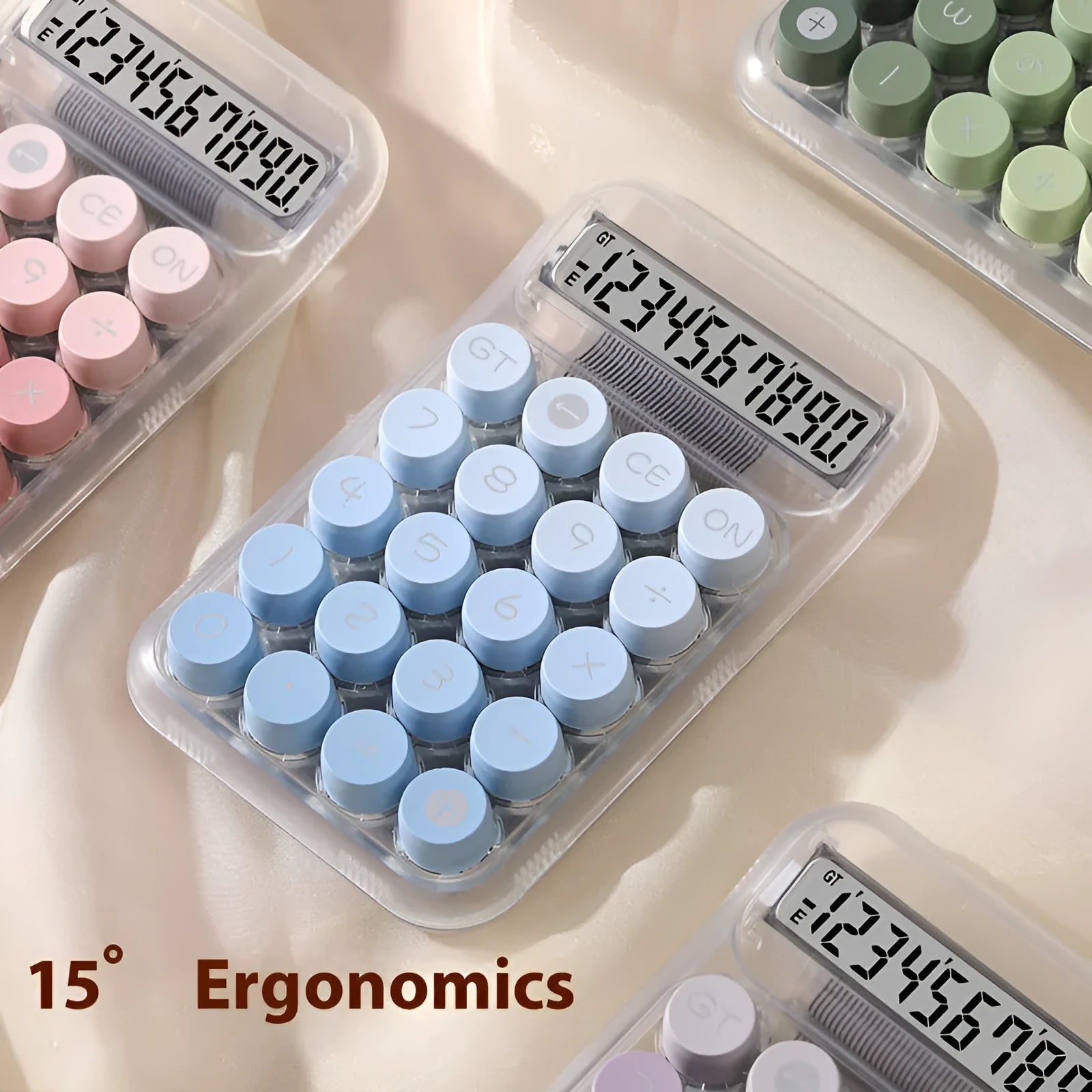 Gradient colour round mechanical keyboard calculator in muted blue, green, pink, or purple on a desk.