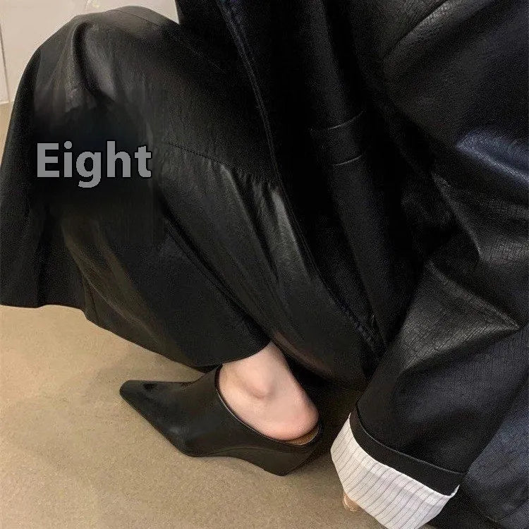 Women's Black closed toe wedge half slippers made of PU leather
