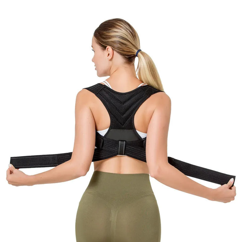 Black adjustable anti-humpback posture correction belt worn on a person's torso, showing shoulder straps and chest support.