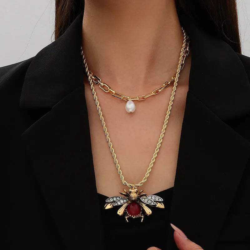 Retro bee drop earrings in alloy with regular chain, shown in gold or antique white K for women