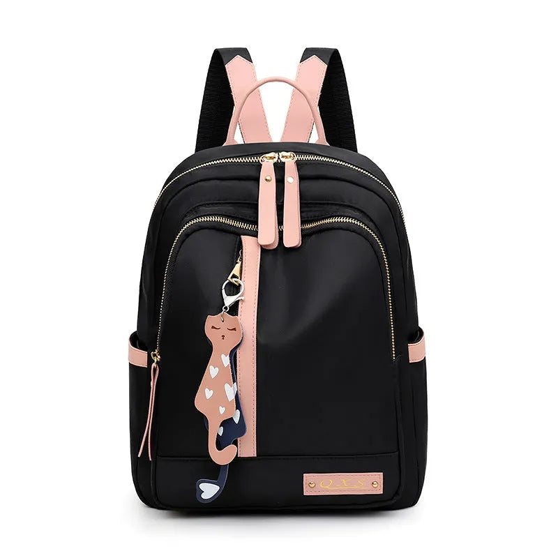 Black casual nylon backpack with double shoulder straps and external pocket.