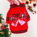Red dog wearing Christmas-themed polyester jumper for holiday events