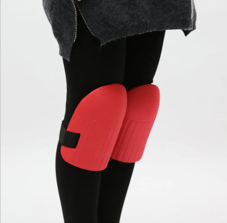 A pair of thick EVA foam knee pads in army green colour for garden and sports use.