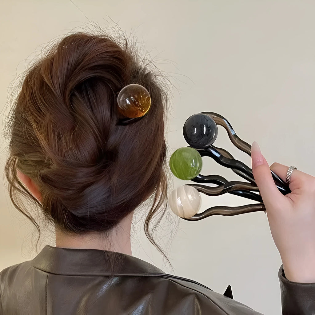 U-shaped acrylic hair barrettes with ball retro design in beige, caramel, dark gray and green colours