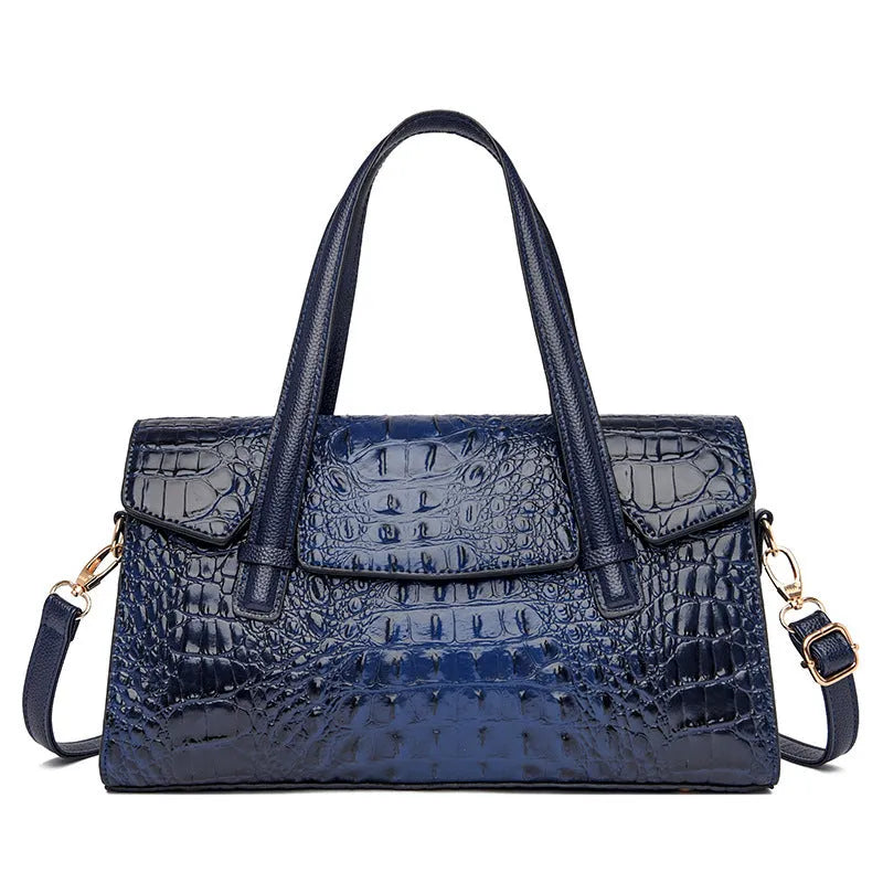 Soft leather messenger bag in horizontal square design with single shoulder strap