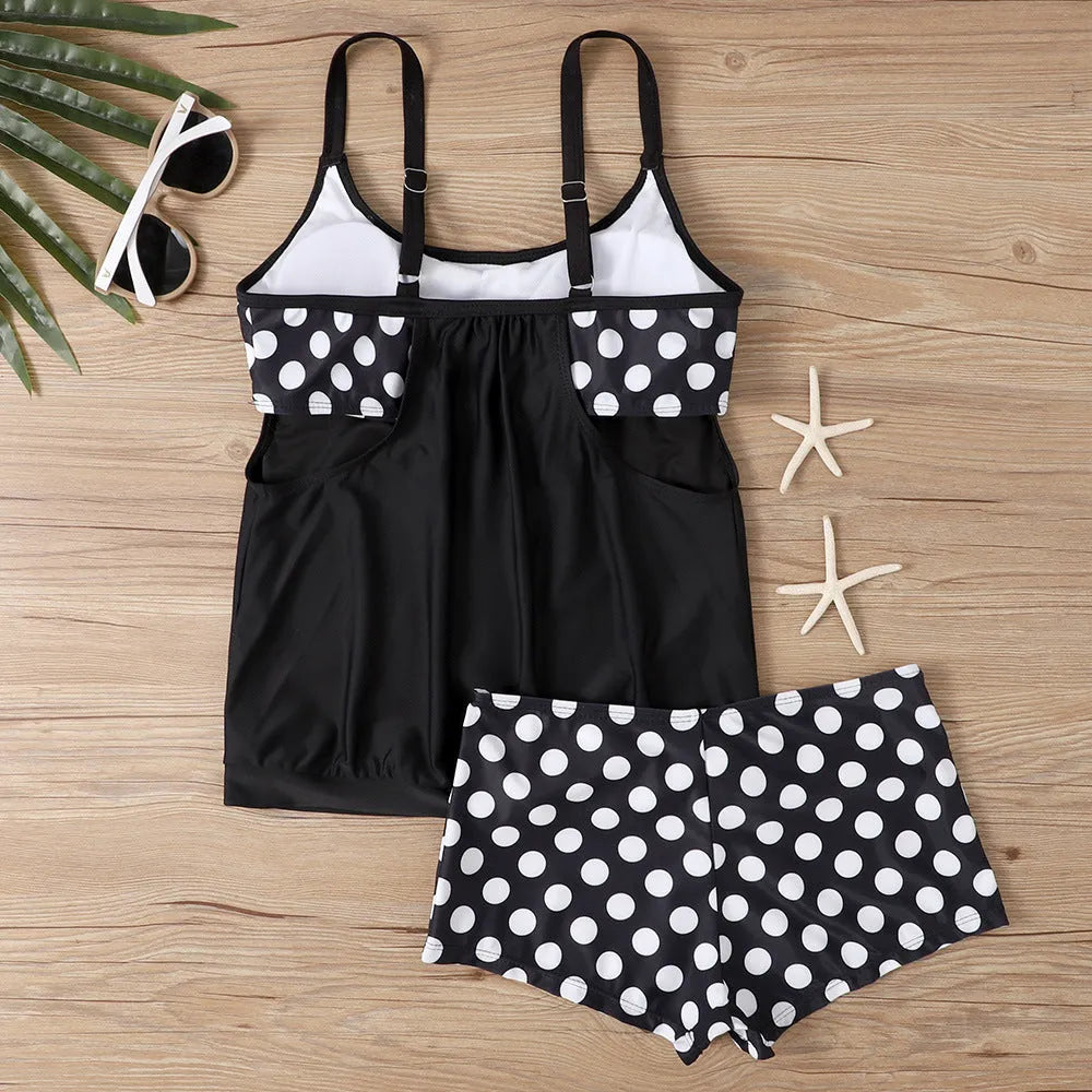 Women's black polka dot high-waist two-piece swimsuit for swimming and fitness.