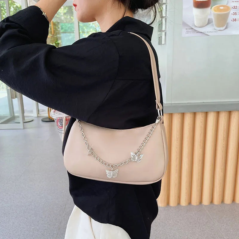 Retro butterfly chain underarm bag in PU leather with internal organisation compartments