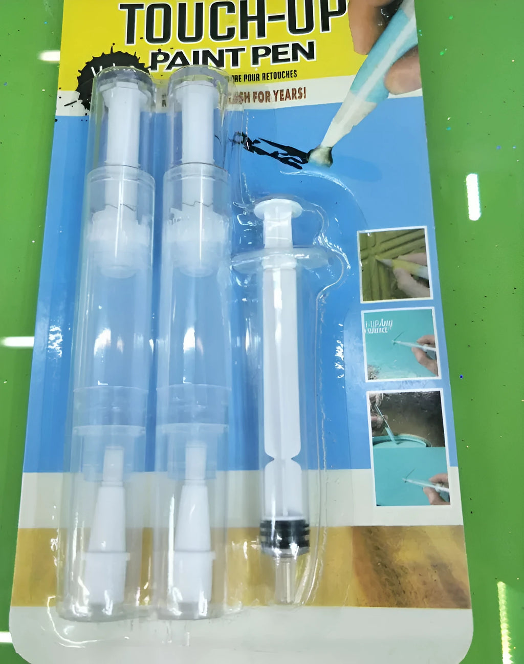 Black paint pen with fine tip for marking on glass, plastic, wood, and metal surfaces