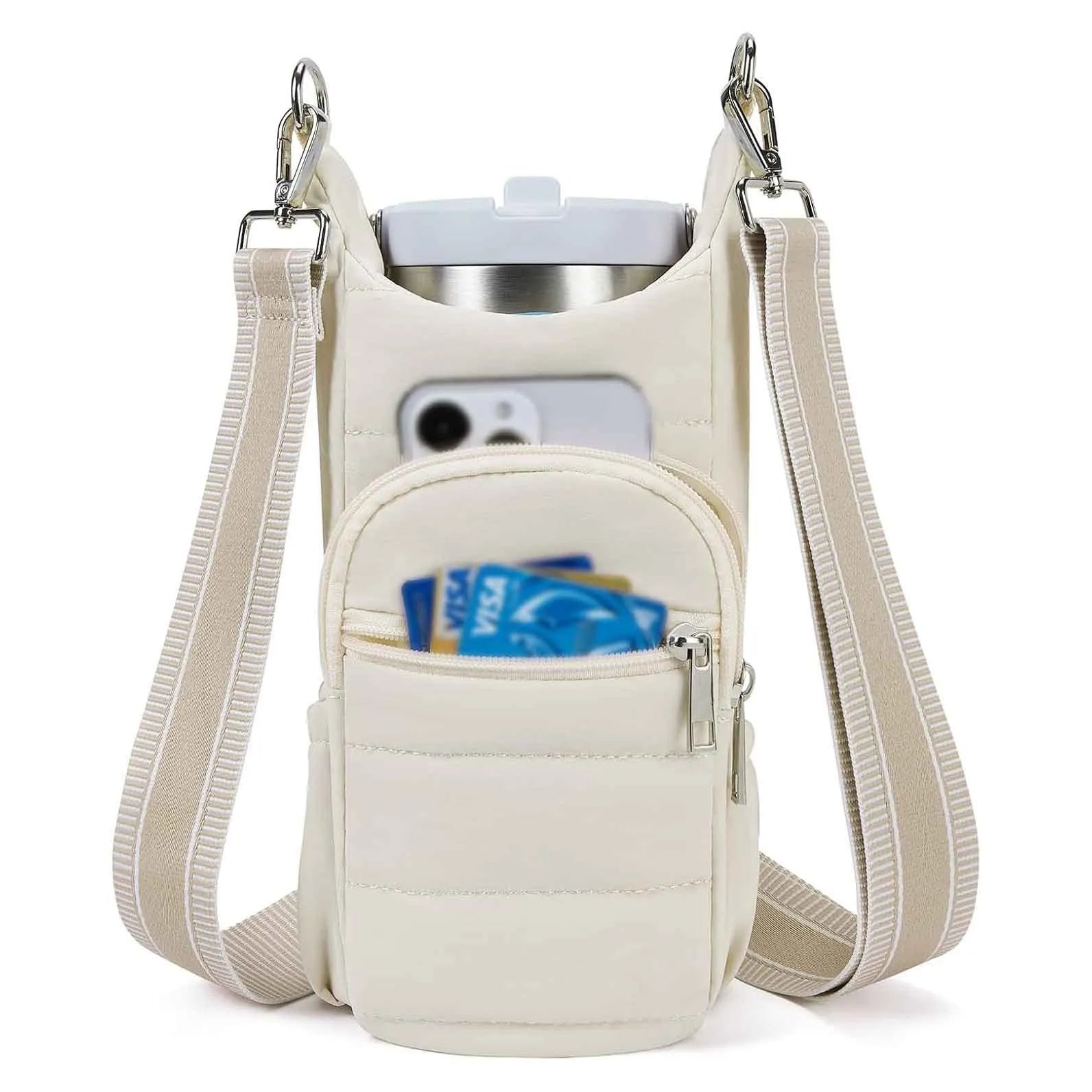 Cloth bicycle water bottle bag in beige, black, or pink colour on a bike frame.