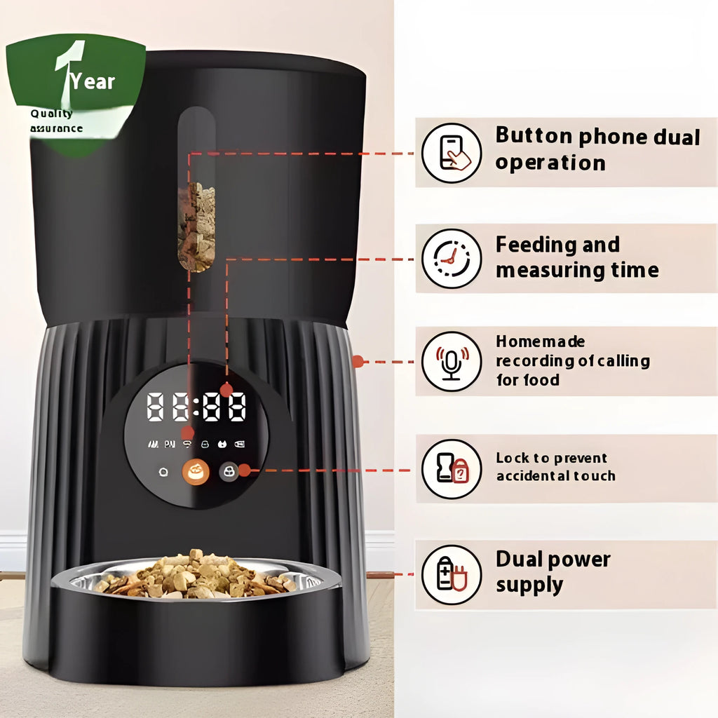 Black automatic pet feeder with digital display and food bowl on a kitchen counter.
