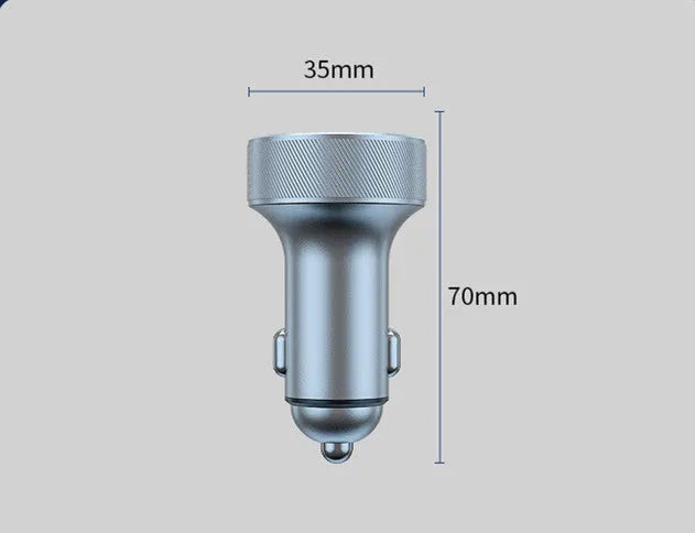 Black aluminium alloy car charger with digital display plugged into a vehicle cigarette lighter.