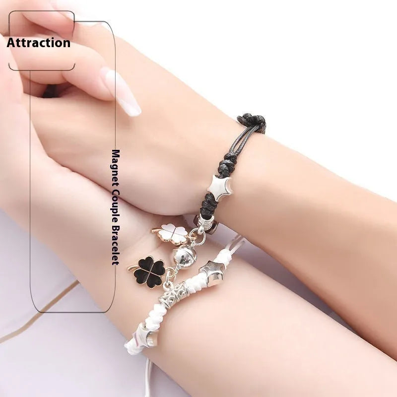 Magnetic couple bracelet set with electroplated alloy construction and various charm designs