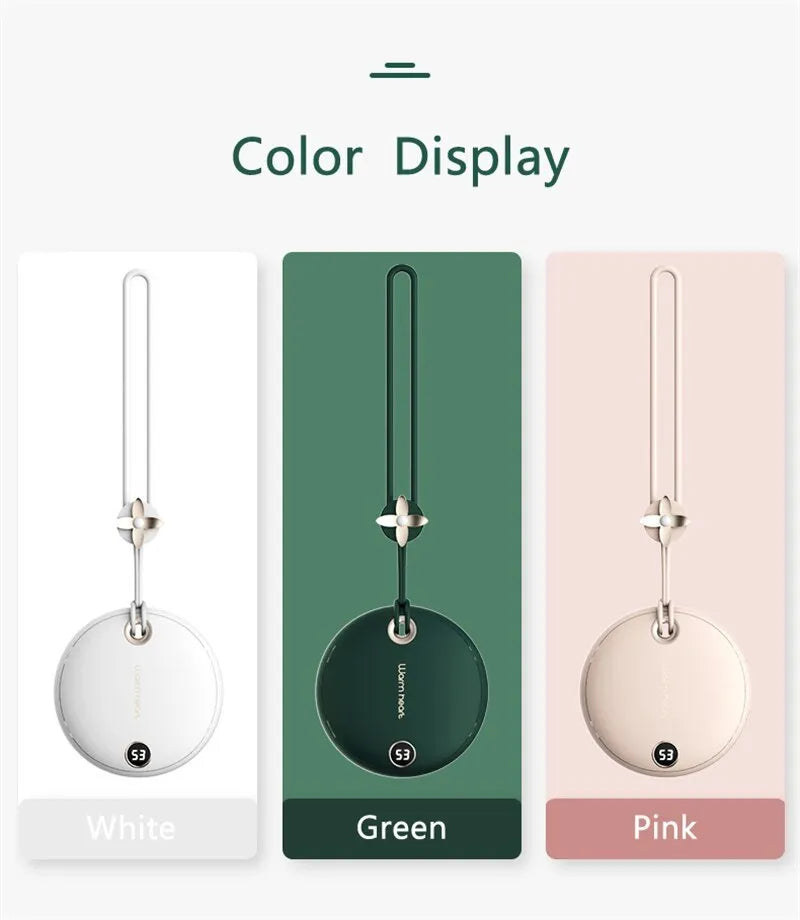 Green hand warmer power bank with digital display showing charge level, next to a charging cable.