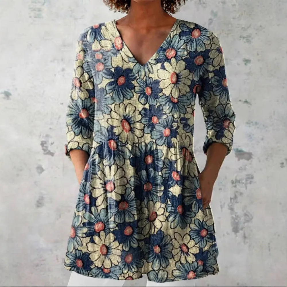Women's slim fit retro patterned long-sleeved top in a polyester fabric, shown in one of twelve available colourways.