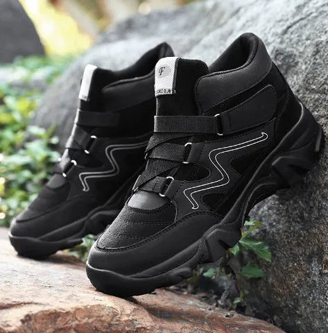 A pair of men's classic lace-up casual shoes on a plain background.