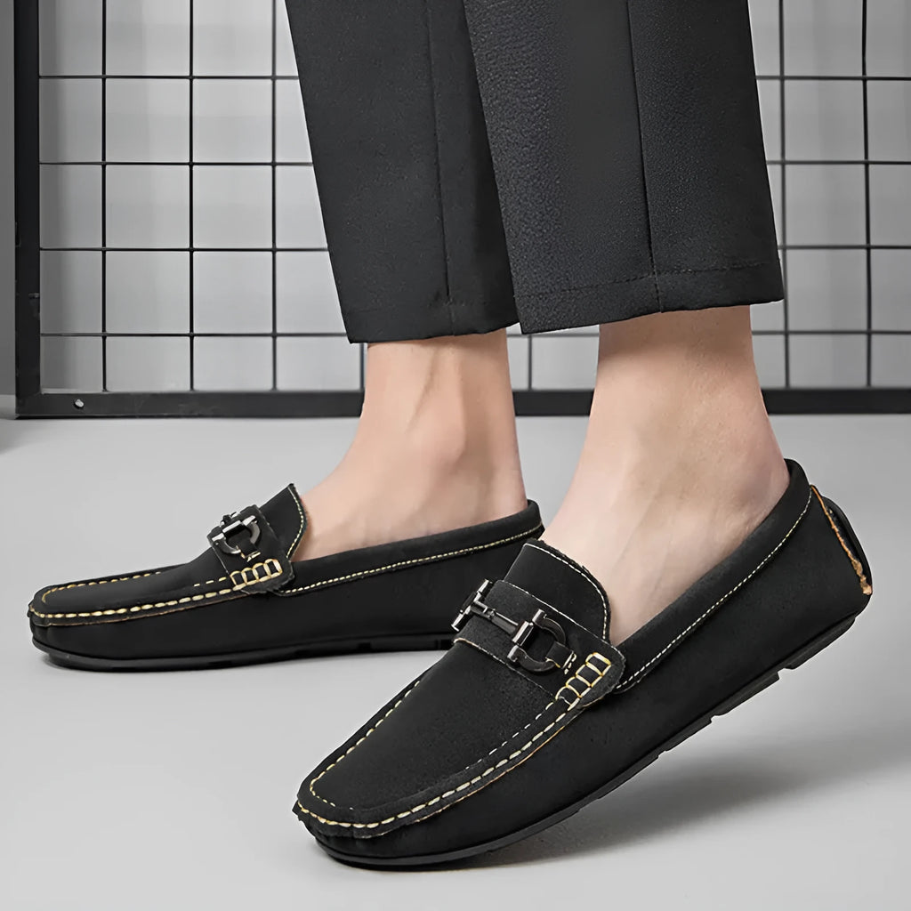 Men's beige leather casual loafers with a round toe and rubber sole.