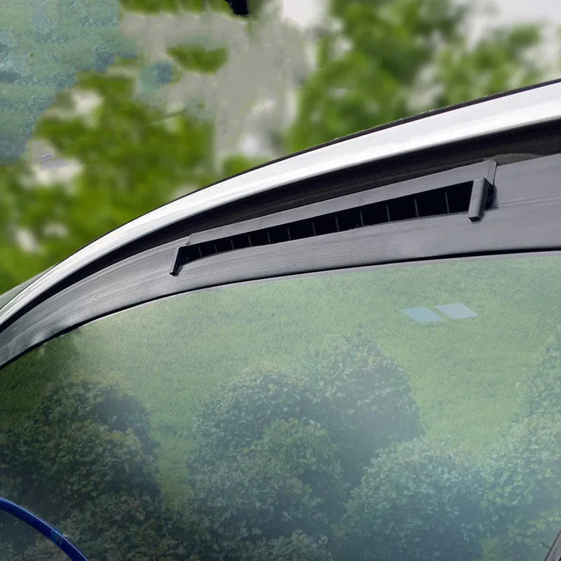 Black and white USB-powered car ventilation fan for exhaust of interior heat and odours with 1.5m cable