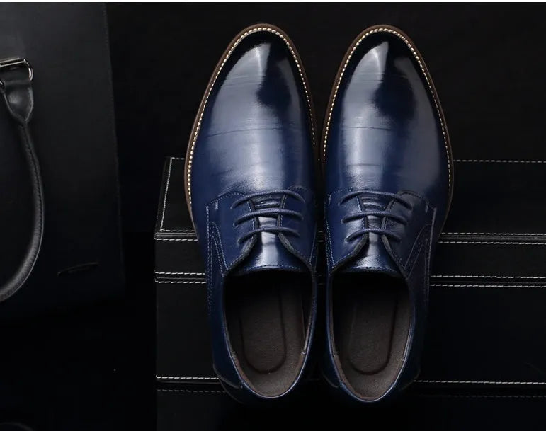 Men's artificial leather business shoes with rivet detail, plain pattern, rubber sole in black colour, size 38-48
