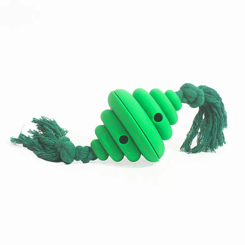 Green and yellow dog ball with integrated rope, hollow treat-dispensing design