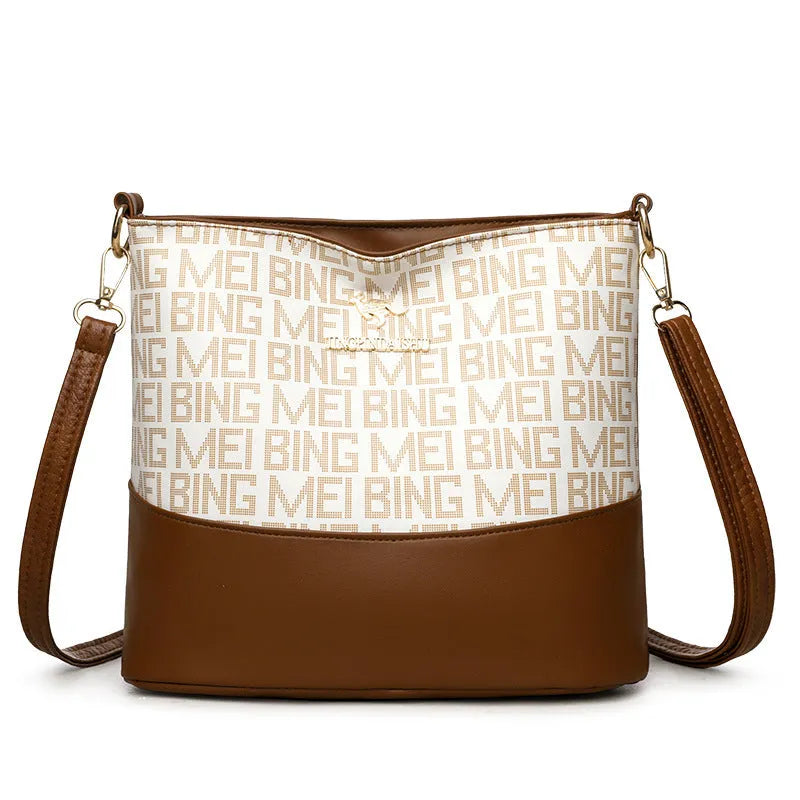Brown retro messenger bag with soft leather texture showing interior phone and file compartments